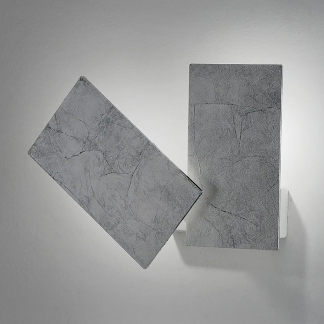 Abat-jour gradable avec diffuseurs plats rectangulaires orientables.